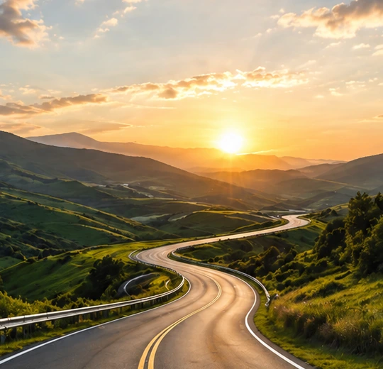 Winding road at golden sunset — Road to Happiness Psychotherapy Toronto